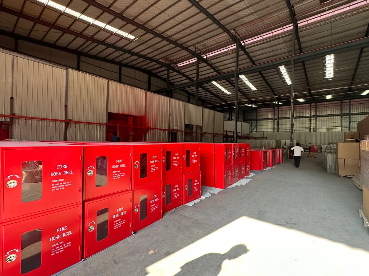 Assembly and finishing bay with fire hose reel cabinets at Wanlian Fluid